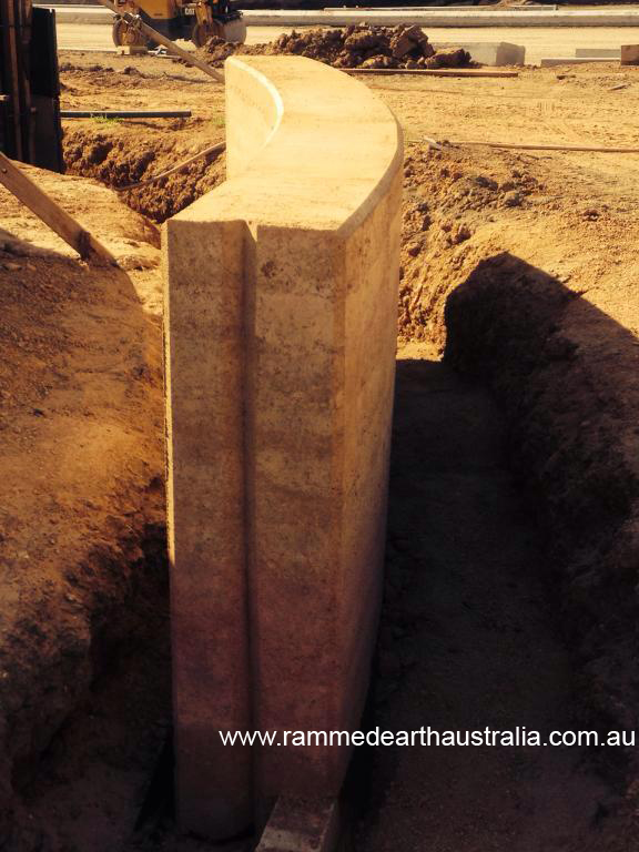 Curved multi coloured Rammed Earth in Sydney