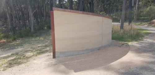 Curved Rammed Earth Wall