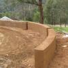 This garden wall in Harrietville was created using Flexiform(TM) - only available through Riverina Rammed Earth