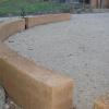 uncapped curved retaining wall