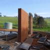 Another completed rammed earth wall section